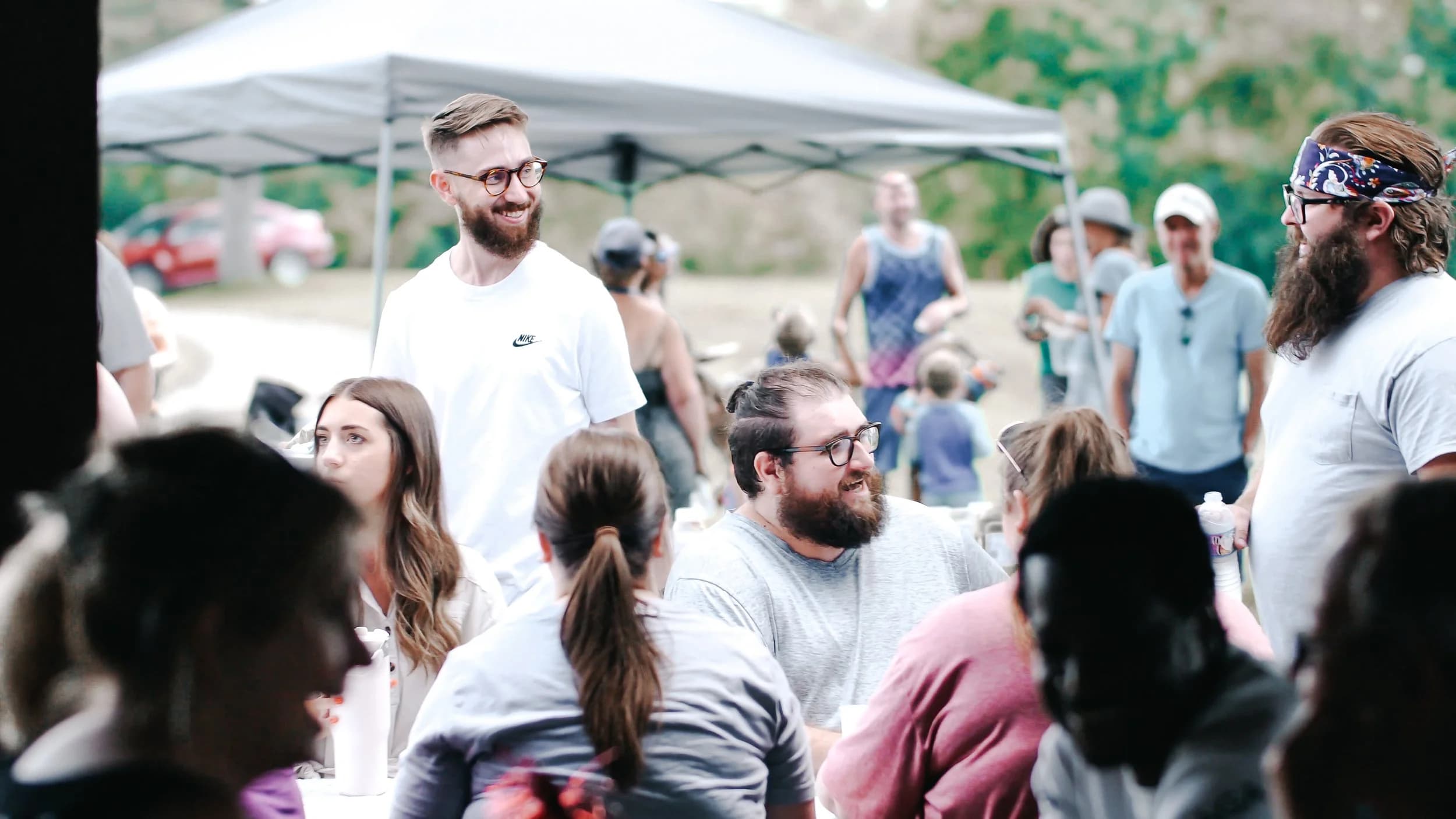 Josh Burns with the church community at an outdoor gathering