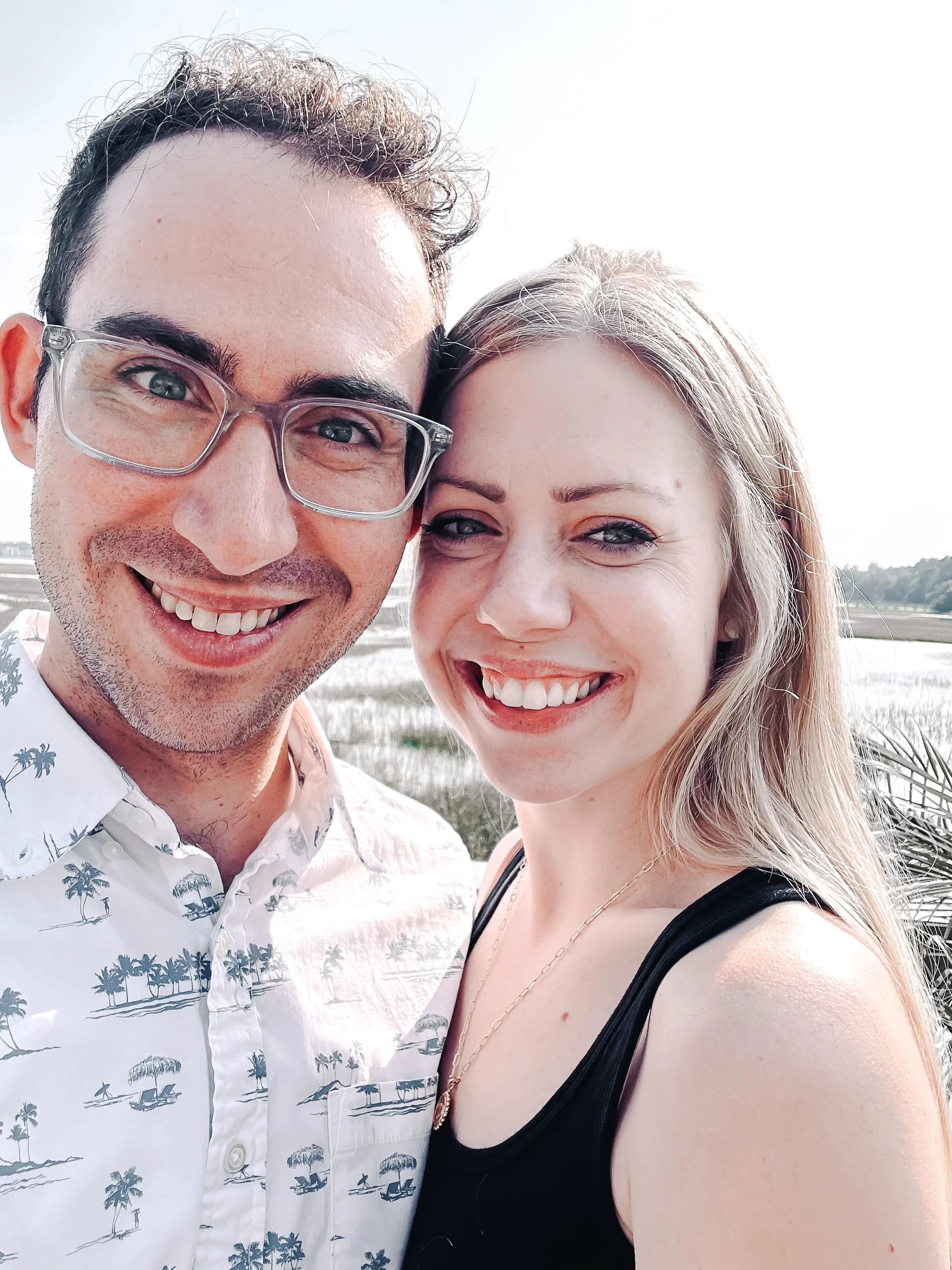 Luke Kutler and his wife Brenna outdoors on a sunny day