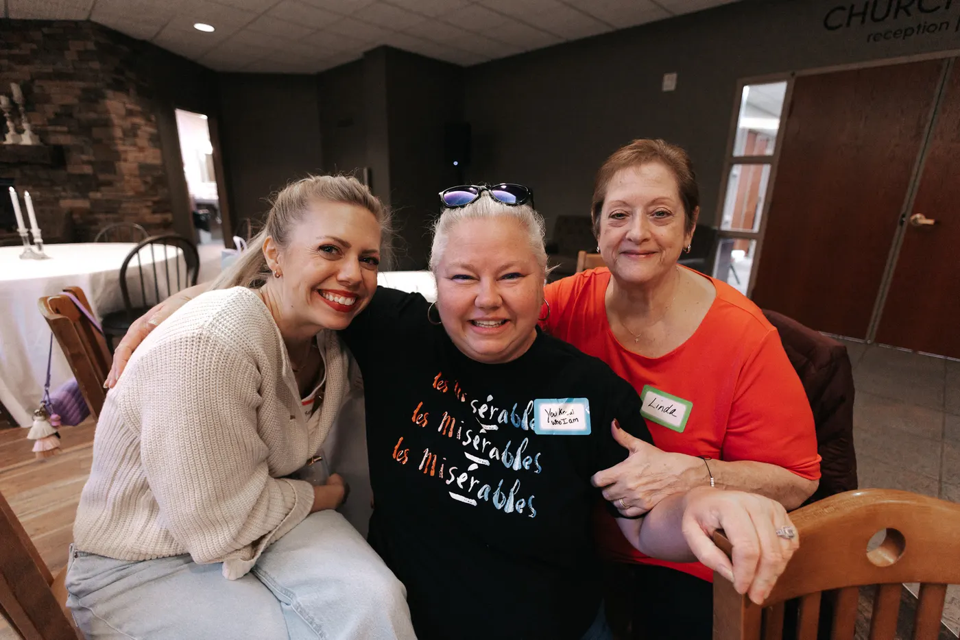 Volunteers together in the reception room